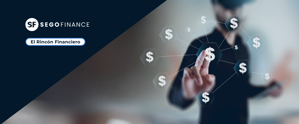 cabecera-segofinance-rincon-financiero-anatomia-de-una-ronda-de-financiacion Interfaz gráfica con iconos de signos de dólar conectados entre sí, simbolizando el flujo de capital en una ronda de financiación. En el fondo, una persona desenfocada interactúa con la pantalla.