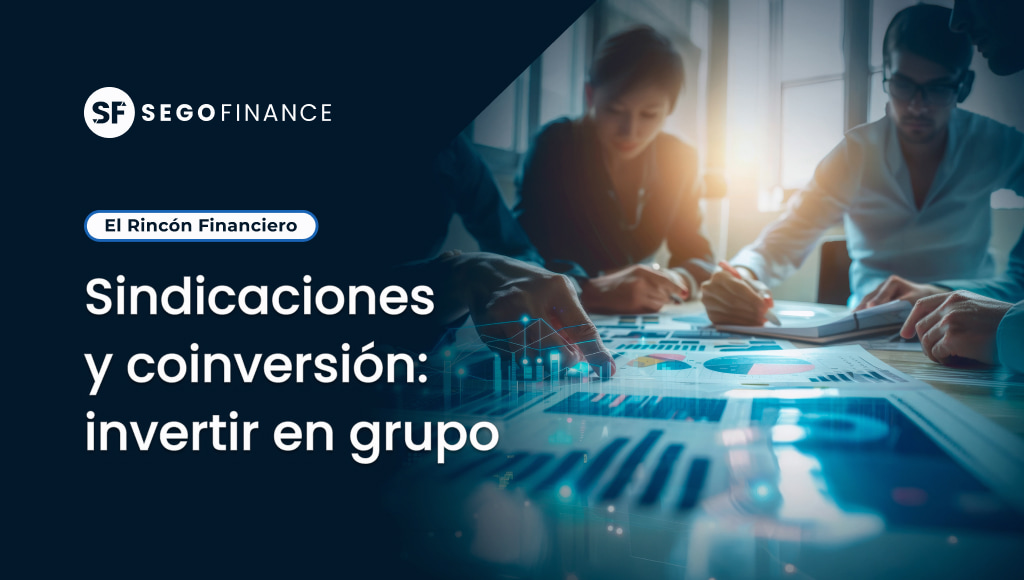Grupo de inversores analizando datos financieros en una sindicación de inversión en startups